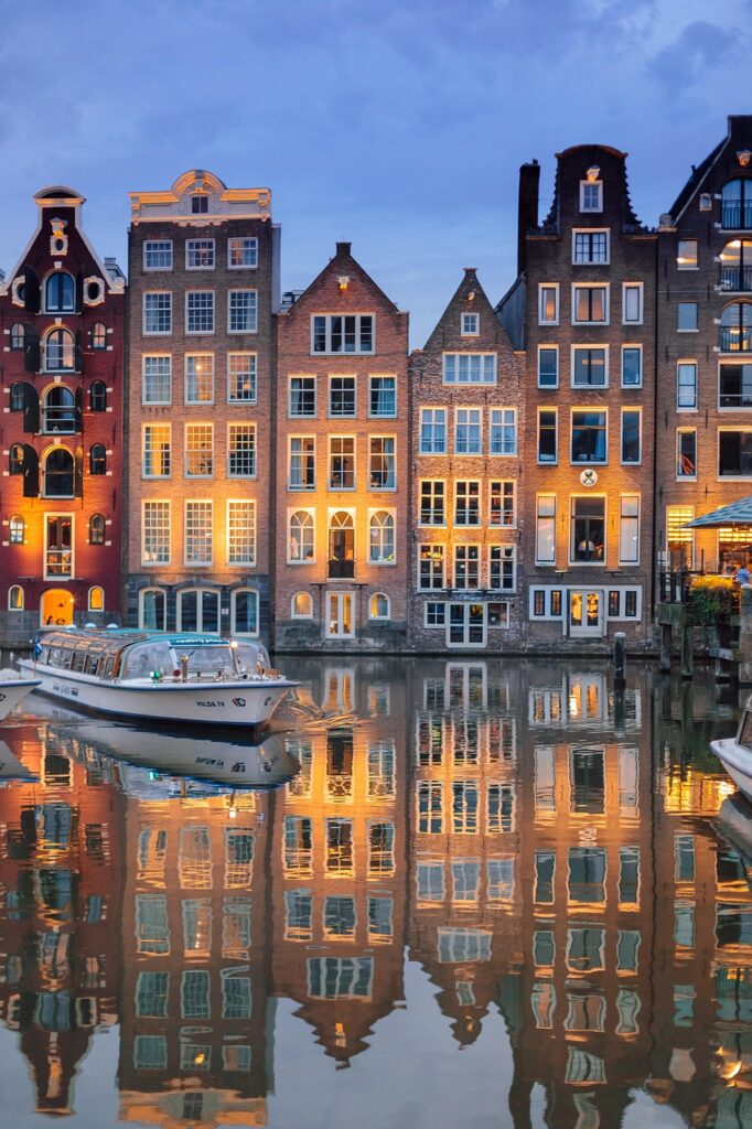 buildings, architecture, river, illuminated, reflection, mirror image, mirroring, boat, sailing, cruise, river cruise, amsterdam, nature, city, evening, phone wallpaper, night time, lights, netherlands, holland, water, sky, ship, tourism, amstelpark, amsterdam-buitenveldert, houses, aesthetic wallpaper, iphone wallpaper